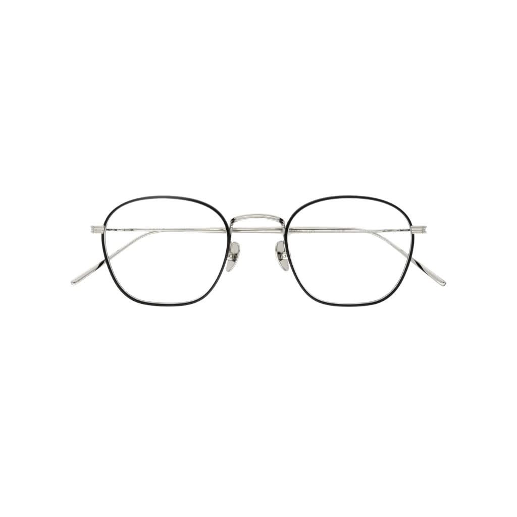 Designerbrille von AKILA Osiris 02 – Frontansicht der schwarzen Titanbrille mit silbernen Details, erhältlich bei Optik Bartholomä München