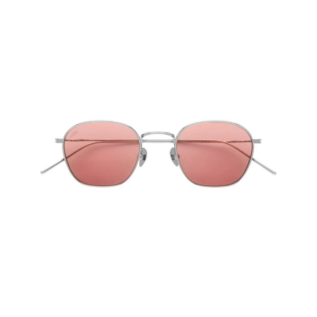 Frontansicht der AKILA Osiris Sonnenbrille in Silver / Rose bei Optik Bartholomä in München – rechteckige Fassung mit roséfarbenen Gläsern.