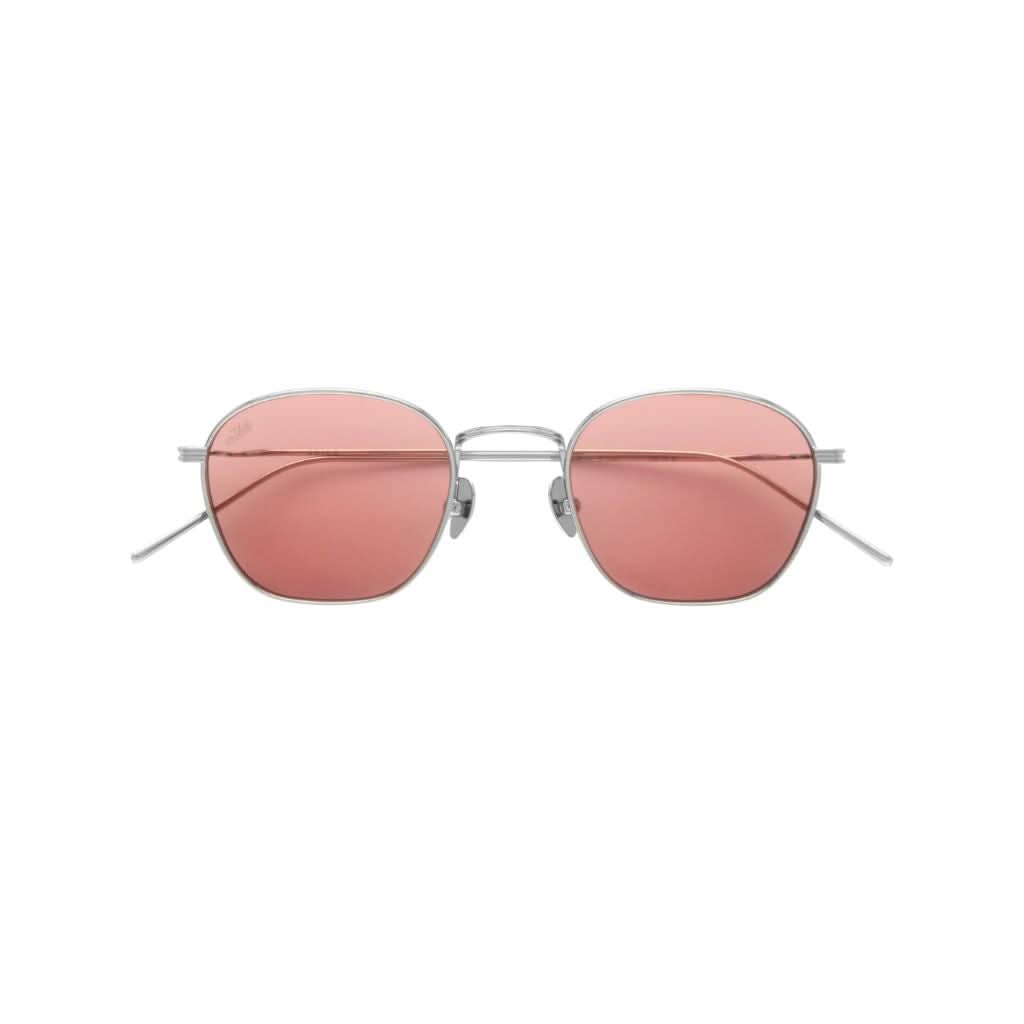 Frontansicht der AKILA Osiris Sonnenbrille in Silver / Rose bei Optik Bartholomä in München – rechteckige Fassung mit roséfarbenen Gläsern.
