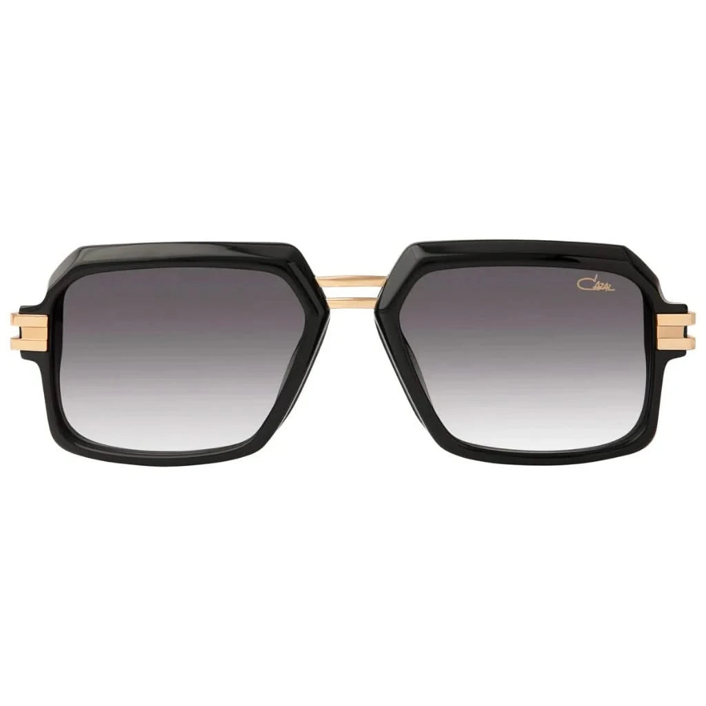 Markante Sonennbrille von Cazal Eyewear Modell 6004/ 3 mit markantem, schwarzem Rahmen und goldenen Akzenten, erhältlich bei Brillen Schneider, Ihrem Optik- und Augenoptiker in München.