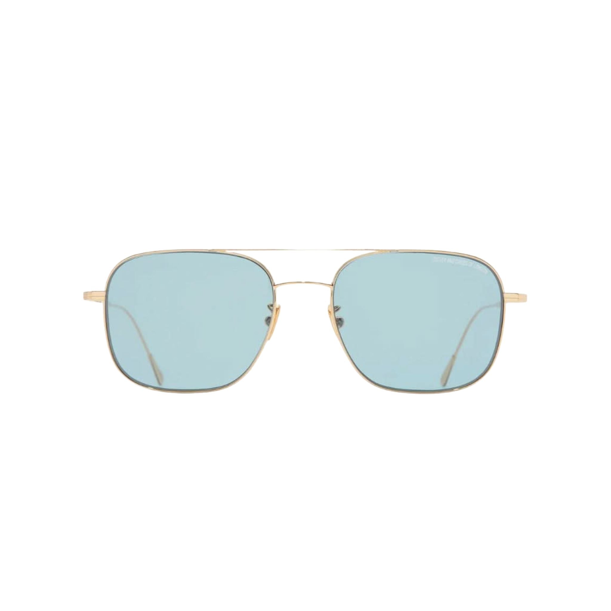 Frontansicht der Cutler and Gross Aurum 0003 Sun 03 bei Brillen Schneider München – luxuriöse Sonnenbrille in 18K Gold mit blauen ZEISS Gläsern.