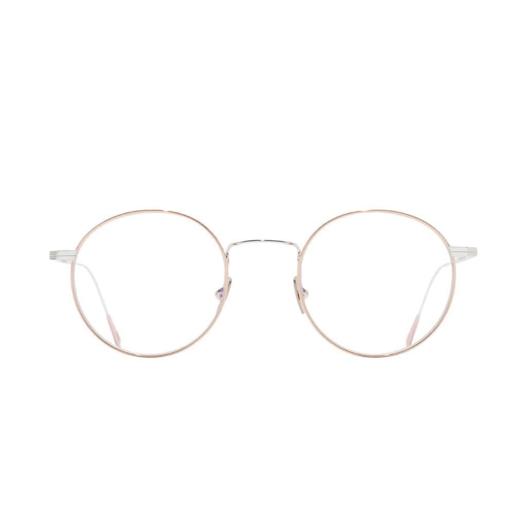 Aurum 0001 04 von Cutler and Gross – elegante Frontansicht in 18K Roségold + Rhodium bei Brillen Schneider München.