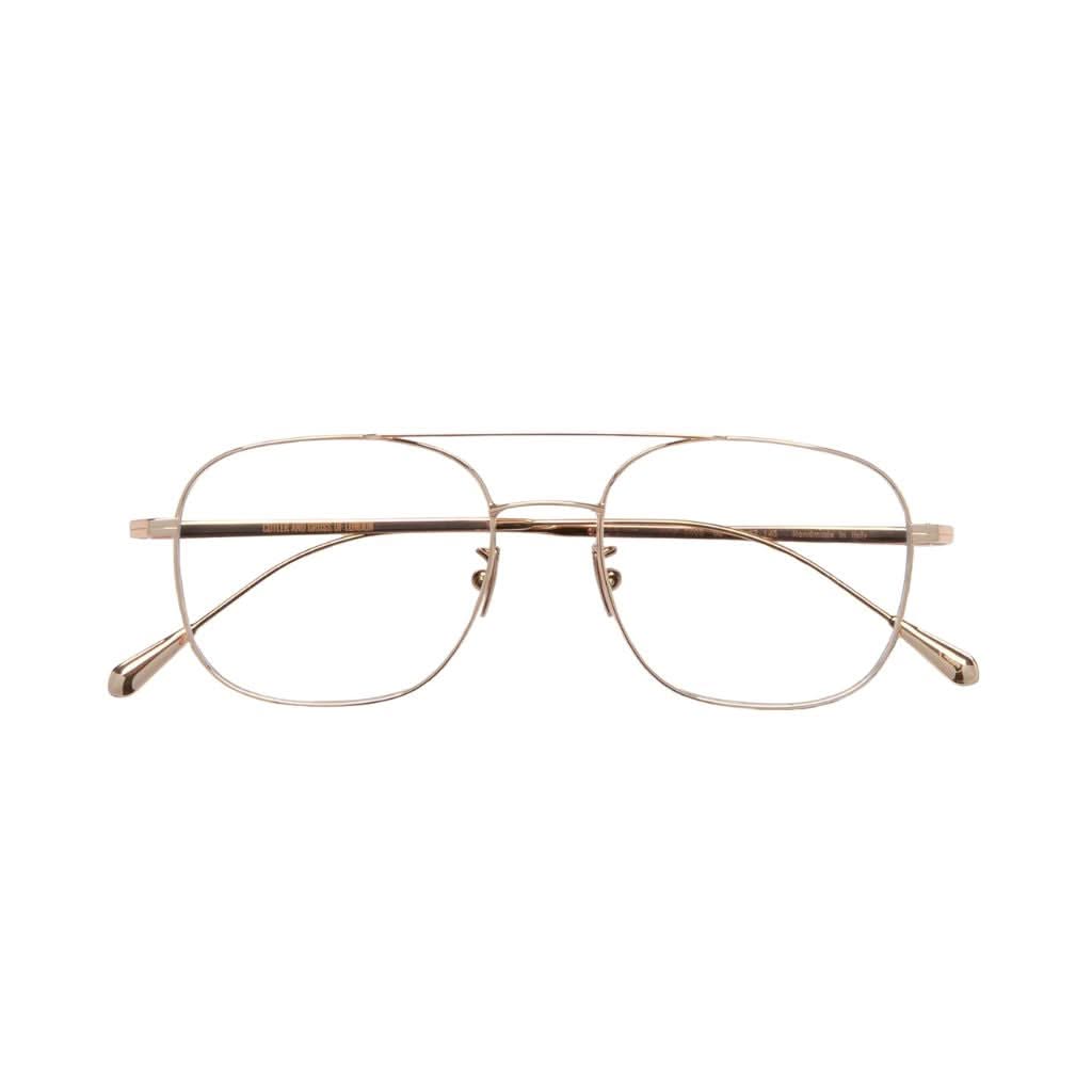 Detailansicht der Cutler and Gross Aurum 0003 02 bei Brillen Schneider München – fein verarbeitetes 18K Roségold und dezente Designdetails.