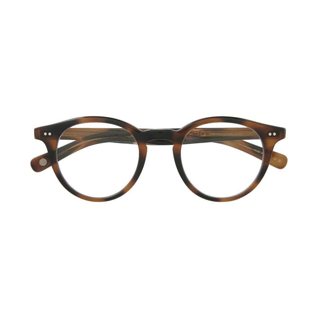 Garrett Leight Brille, Modell Clune X in der Farbe Spotted Brown, erhältlich bei Optik Bartholomä in München. Elegantes Design mit einem einzigartigen gepunkteten Braun-Muster für einen klassischen, zeitgemäßen Look