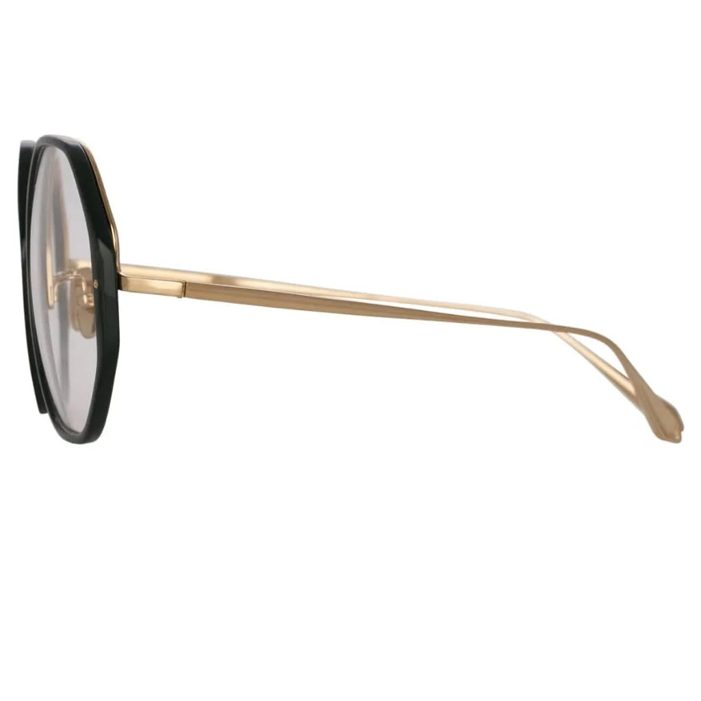 Die Linda Farrow Alona Forest Brille aus edlem Acetat, kombiniert mit einer eleganten weißen Kette, erhältlich bei Brillen Schneider, Ihrem Augenoptiker in München, für höchsten Tragekomfort und Stil.