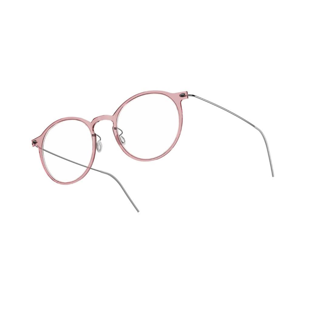 Brille Modell 6541 C20 von Lindberg -Seitenansicht der rosa Acetatfront mit filigranen grauen Titanbügeln. Stilvolles Design mit einem Hauch von Farbe, erhältlich bei Brillen Schneider in München."