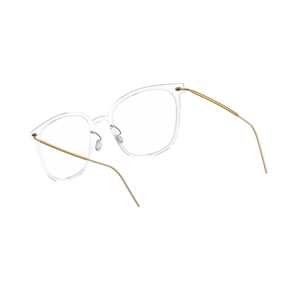 Seitenansicht: "Brille Modell 6638 C07 von Lindberg, Seitenansicht, klare transparente Acetatfassung mit goldenen Titanbügeln. Schlichte Eleganz und hochwertige Verarbeitung, erhältlich bei Brillen Schneider in München.