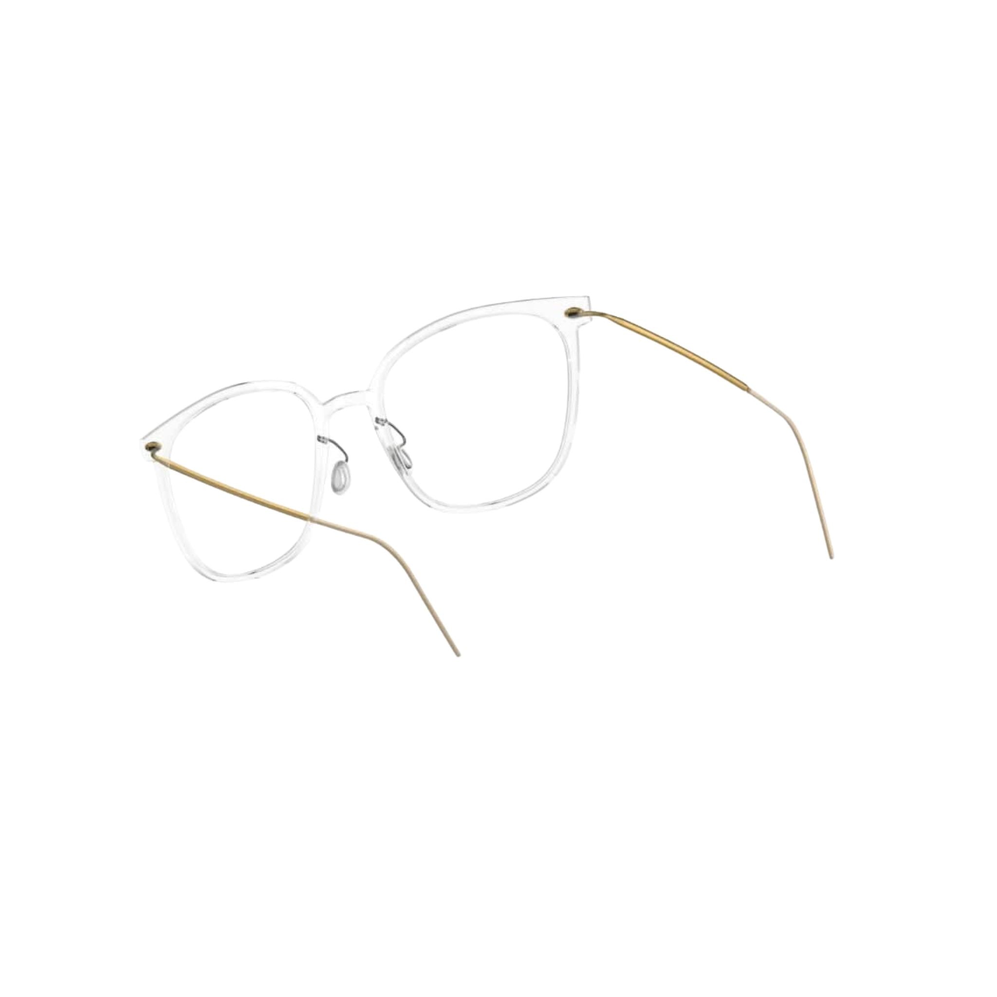 Seitenansicht: "Brille Modell 6638 C07 von Lindberg, Seitenansicht, klare transparente Acetatfassung mit goldenen Titanbügeln. Schlichte Eleganz und hochwertige Verarbeitung, erhältlich bei Brillen Schneider in München.