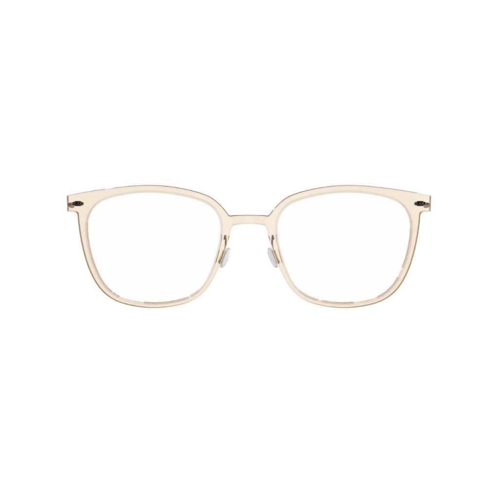 Brille Modell 6638 C21 von Lindberg, leicht braun transparente Acetatfassung mit dunkelgrauen Titanbügeln. Elegante Kombination aus klassischen und modernen Elementen, erhältlich bei Brillen Schneider in München.