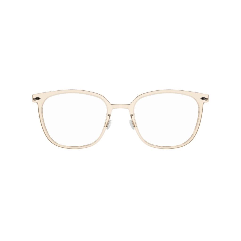 Brille Modell 6638 C21 von Lindberg, leicht braun transparente Acetatfassung mit dunkelgrauen Titanbügeln. Elegante Kombination aus klassischen und modernen Elementen, erhältlich bei Brillen Schneider in München.
