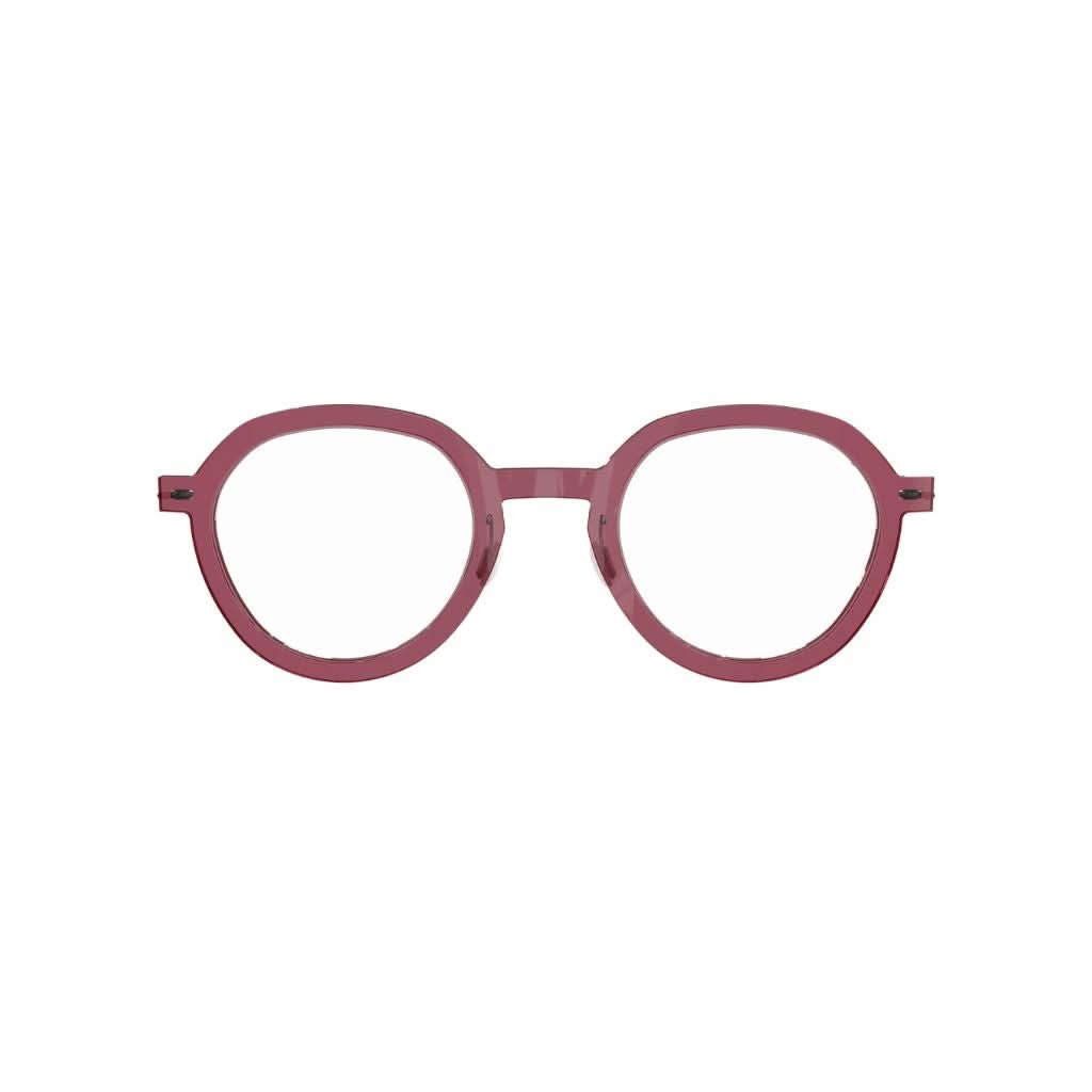 Frontansicht der Lindberg Brille 6640 C04– transparente, leicht beerenrote Acetatfront mit einer runden Form und dezenten, grauen Titanbügeln. Ein elegantes, modernes Design, erhältlich bei Brillen Schneider in München.