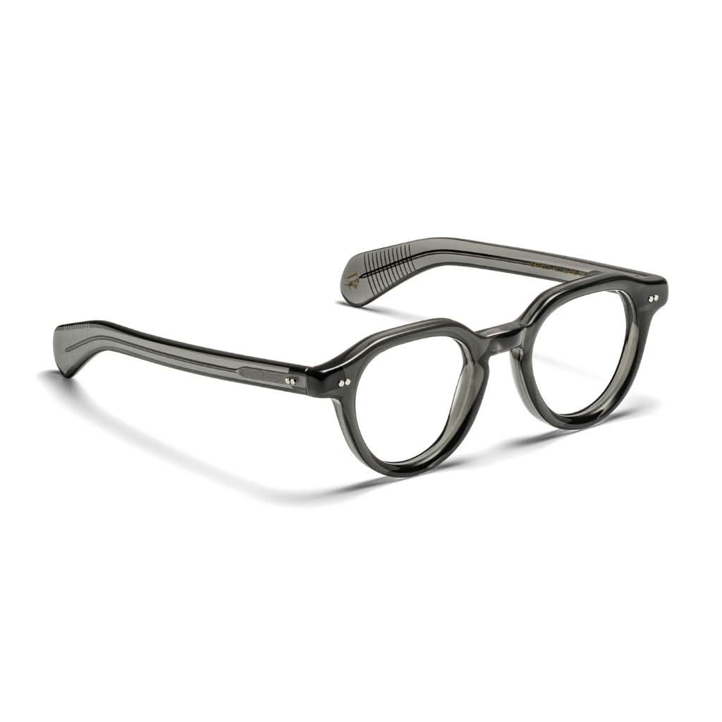 Seitenansicht der Moscot BAITSIM Brille in Grey, bei Optik Bartholomä in München – schlanke Form, klare Linien und dezenter, urbaner Stil.