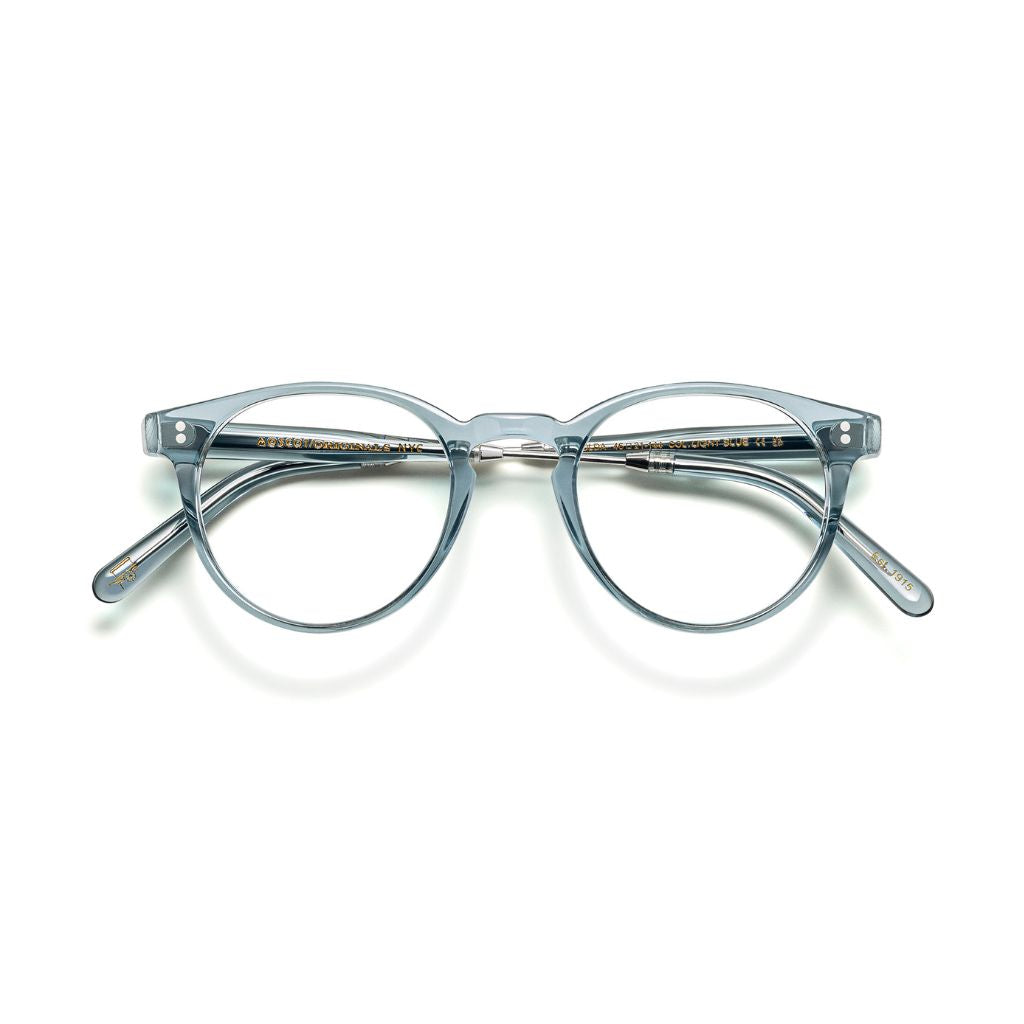 Frontansicht der Moscot GOLDA Brille in Light Blue, erhältlich bei Optik Bartholomä in München – elegantes Metallgestell mit sanftem, blauen Farbton.