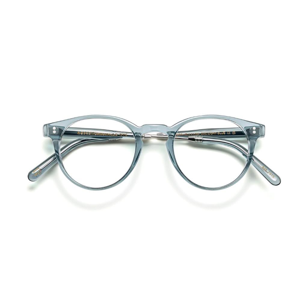Frontansicht der Moscot GOLDA Brille in Light Blue, erhältlich bei Optik Bartholomä in München – elegantes Metallgestell mit sanftem, blauen Farbton.