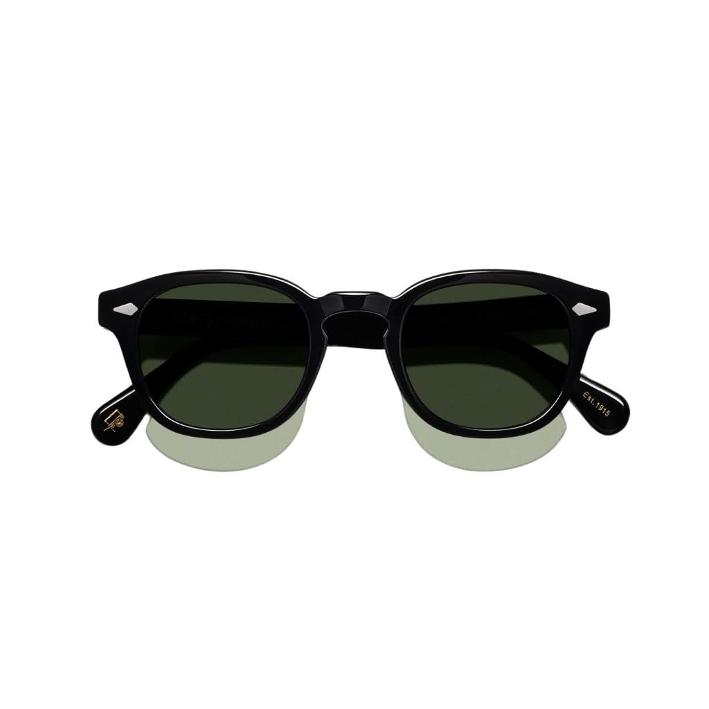 Moscot Lemtosh Sun in Black mit grünen Gläsern – klassische Sonnenbrille im Panto-Stil, erhältlich bei Optik Bartholomä in München.