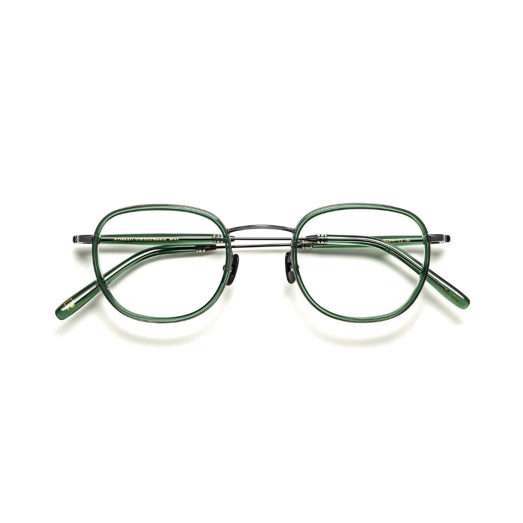 Frontansicht der Moscot Brille Mosha in Pine – eleganter Windsor-Rahmen aus halbtransparentem grünem Acetat und filigranem Metall, erhältlich bei Optik Bartholomä in München.