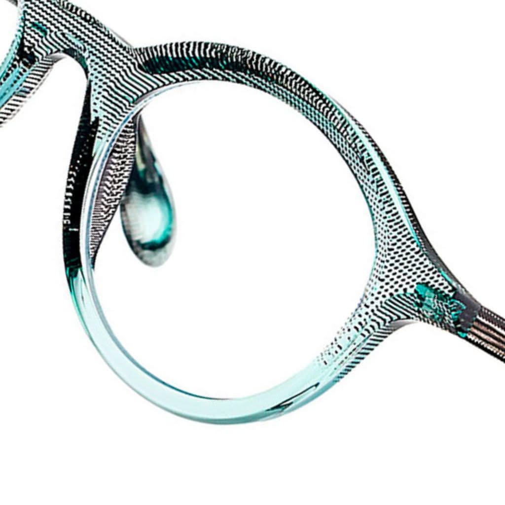 Theo Eyewear Brille Modell Dagbreek 15 mit schwarz-blauem Farbverlauf – elegante Designerbrille bei Brillen Schneider in München, ideal für anspruchsvolle Brillenträger.
