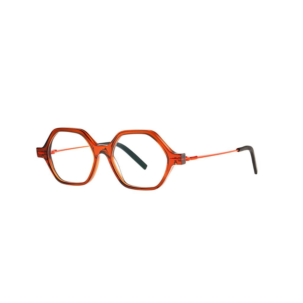 Theo Kids Eyewear Kinderbrille Tantu 68  in einzigartiger Farbkombination aus transparentem Rot/Braun und Blau-Orange. Entdecken Sie dieses stylische Modell bei Brillen Schneider in München.