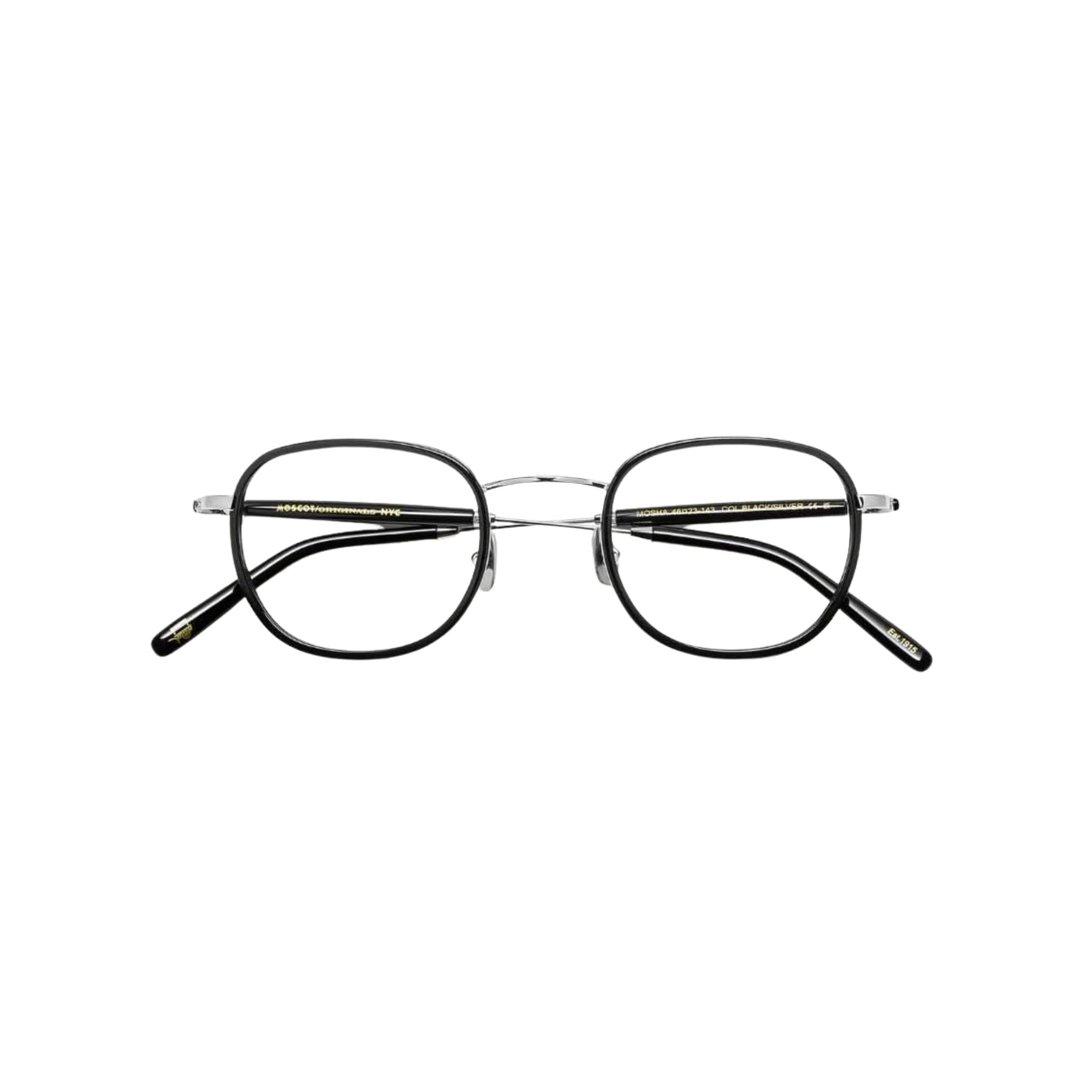 Frontansicht der Brille Mosha von Moscot in Black – eleganter Windsor-Rahmen aus schwarzem Acetat und glänzendem Metall, erhältlich bei Optik Bartholomä in München