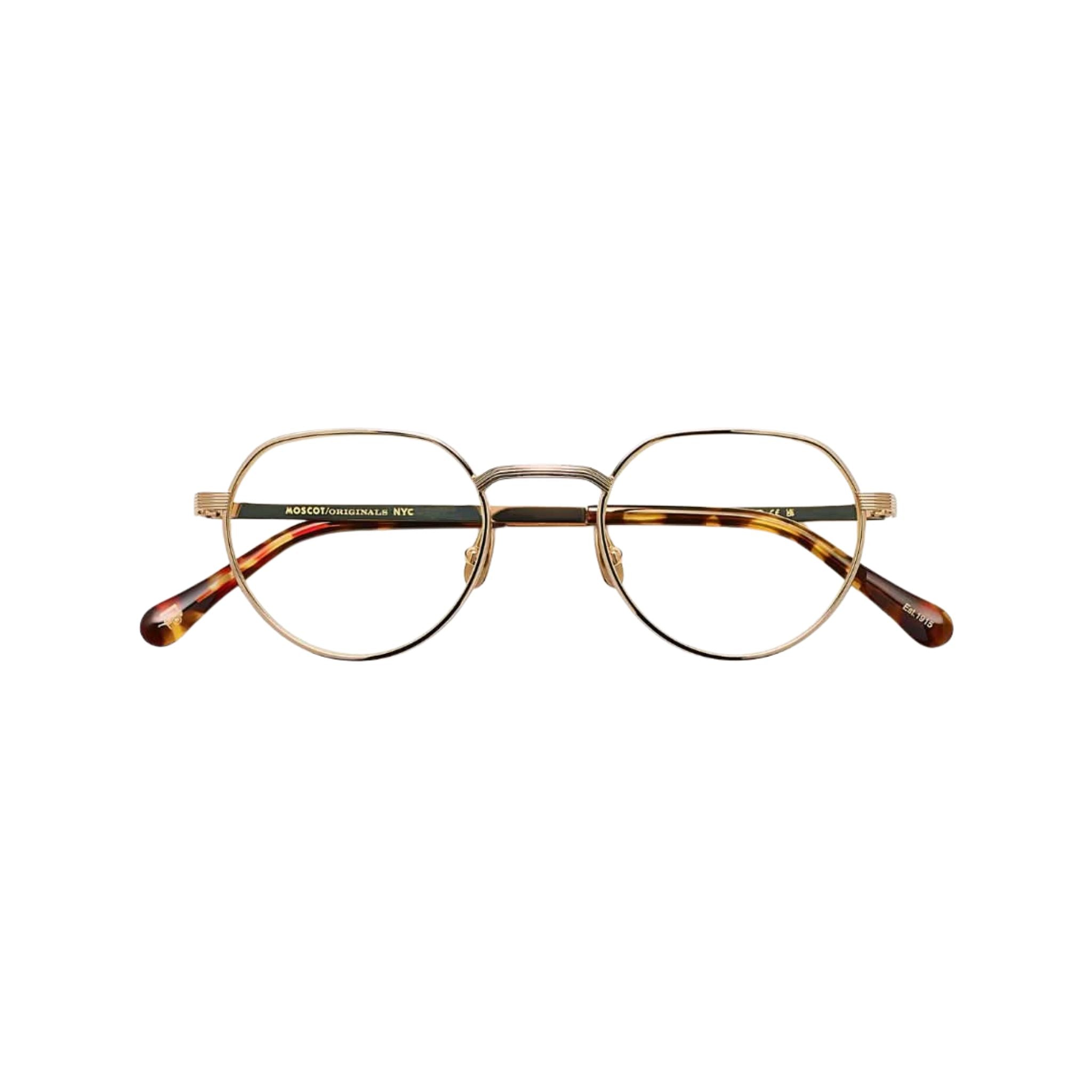 Die SMENDRIK Brille in Gold von Moscot, exklusiv erhältlich bei Optik Bartholomä in München. Elegantes Design mit hochwertigem Metallgestell für einen stilvollen Look.