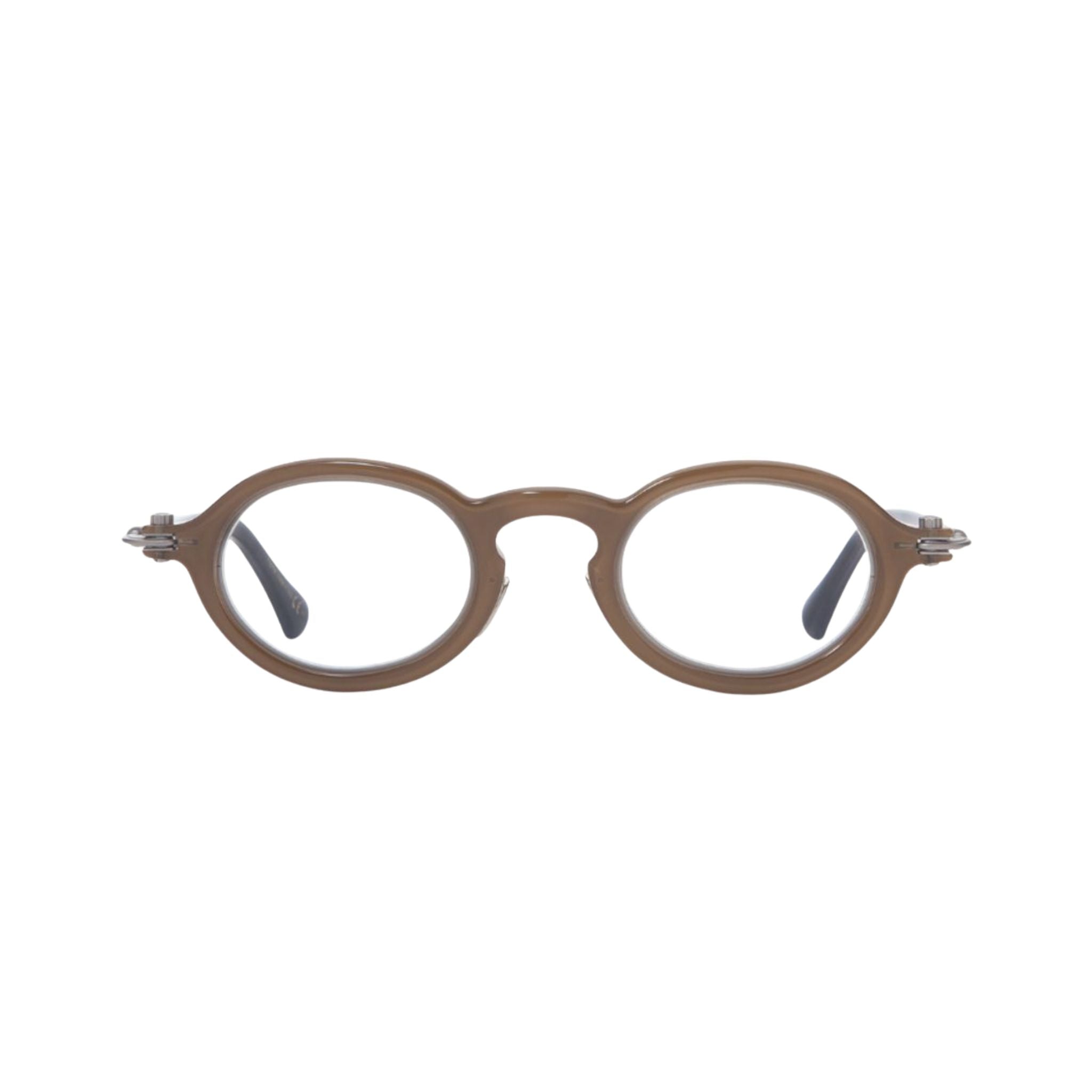 TAVAT Eyewear Token Cappuccino Frontansicht – ovale Designerbrille aus transparent braunem Acetat mit Metall-Details. Jetzt bei Brillen Schneide entdecken - Ihr erfahrener Optiker München